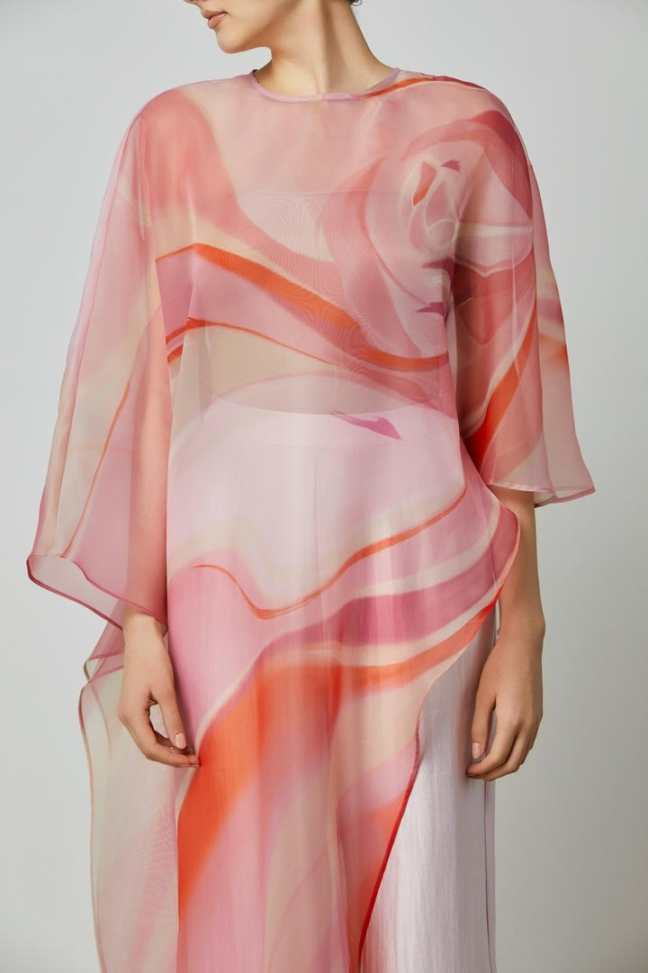 Asymmetrical length top