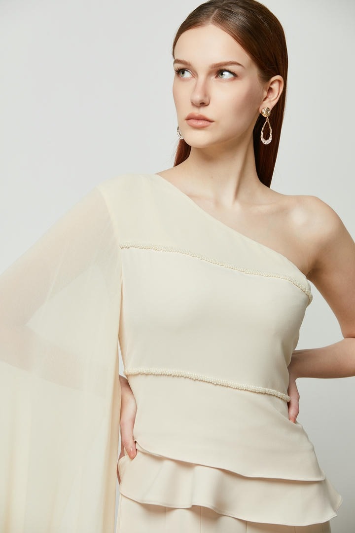 Extra long one sleeve top