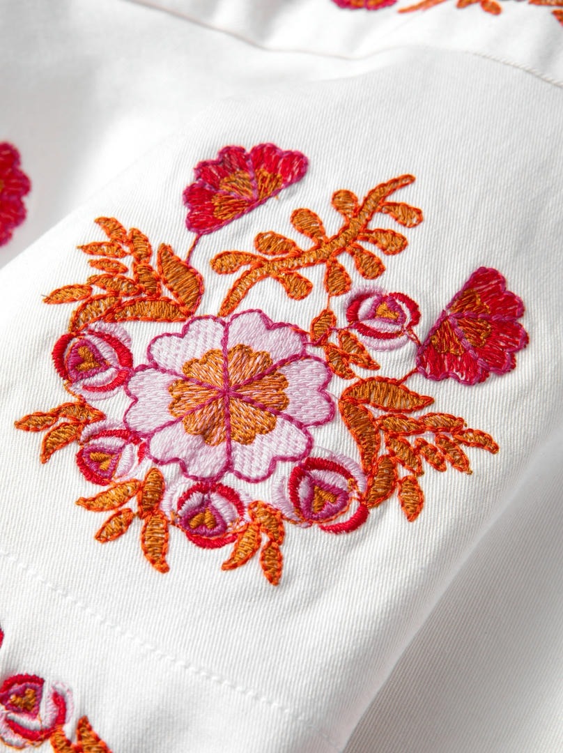 Embroidered Peplum Top